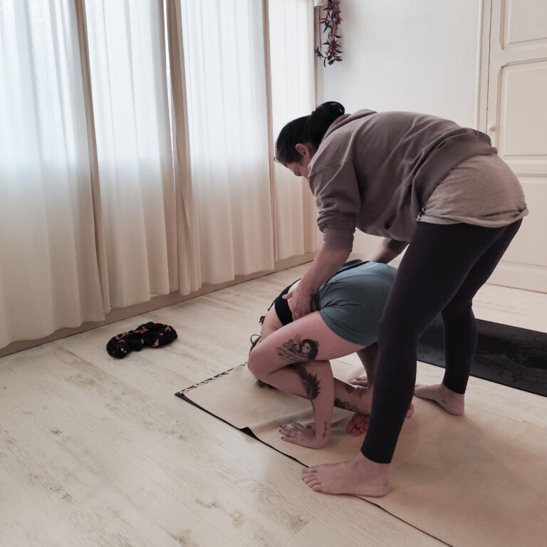 adjusting-bhuja-pidasana